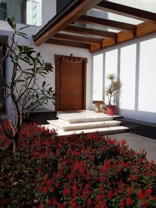 Entrance walkway with a glazed pergola roof